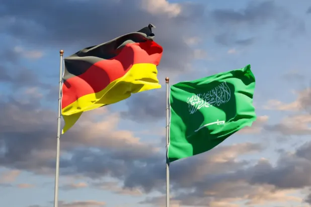 Saudi and German flags fluttering - File Photo/Asharq Al-Awsat