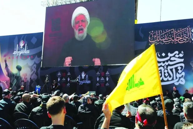 Hezbollah leader Naim Qassem addresses a televised speech to supporters during Ashura Day celebrations in southern Beirut, Lebanon, 06 July 2025. EPA/WAEL HAMZEH