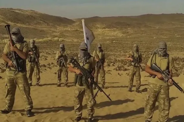 A still image from a circulated video in which the Hasm movement announces its intention to resume operations in Egypt