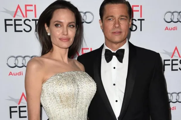 Angelina Jolie ve Brad Pitt, Hollywood'un gözde çiftiydi (AFP)