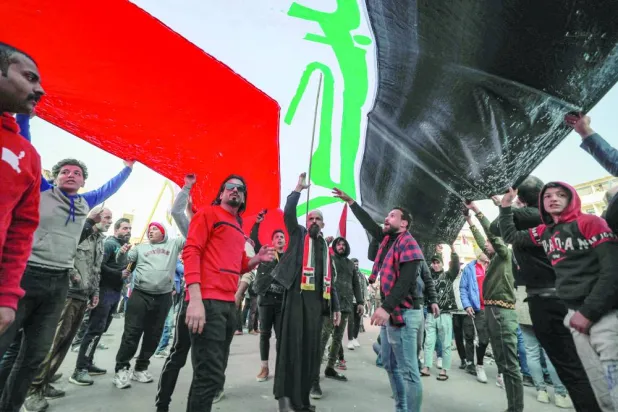 جانب من مظاهرة لناشطين عراقيين وسط بغداد في يناير 2023 (أ.ف.ب)