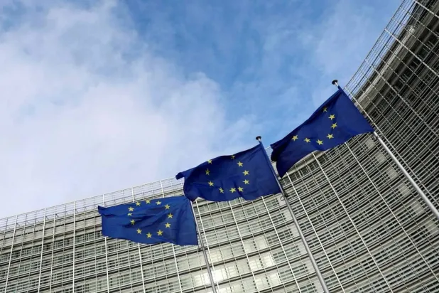 European Union flags fly outside the European Commission in Brussels, Belgium (Reuters) 