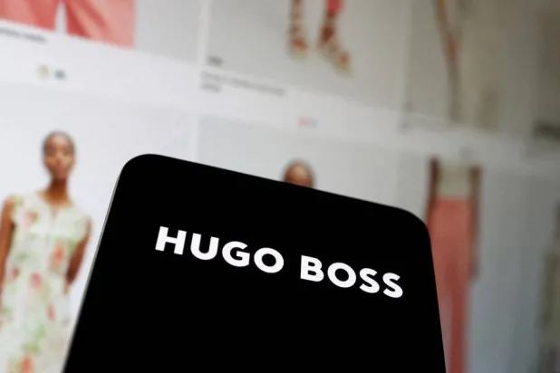 The new Hugo Boss logo and their website shop are seen in this illustration taken, May 17, 2024. (Reuters)
