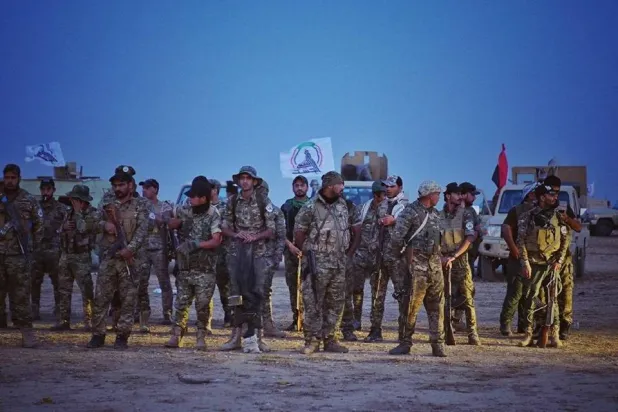 عناصر من «الحشد الشعبي» خلال دورية استطلاع في موقع شمال بغداد (أرشيفية - إعلام الهيئة)