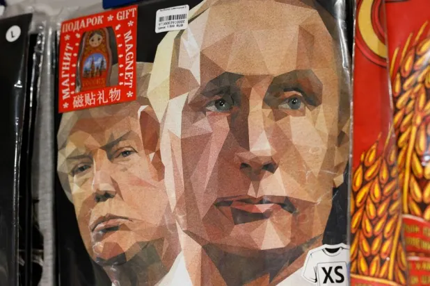 T-shirts with images of Russian President Vladimir Putin and US President Donald Trump are displayed for sale at a gift shop in central Moscow, Russia, August 12, 2025. (Reuters)