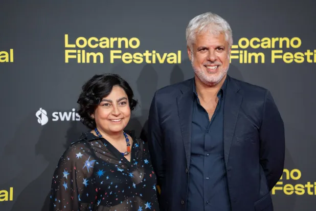 جورج شقير وميريام ساسين خلال تسلّمهما جائزة «لوكارنو»... (المُلحَقة الإعلامية)