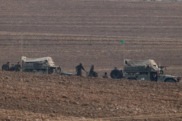 Israeli soldiers operate, near the border with Gaza, in Israel, August 13, 2025. REUTERS/Amir Cohen