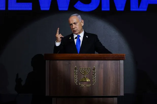 Israeli Prime Minister Benjamin Netanyahu delivers a statement during the US Independence Day reception, known as the annual "Fourth of July" celebration, hosted by Newsmax in Jerusalem on August 13, 2025. (AFP)
