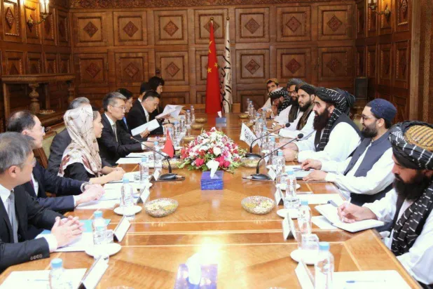 A handout photo made available by the Afghan Foreign Ministry shows Acting Foreign Minister of Afghanistan Mawlawi Amir Khan Muttaqi (3-R) meeting with Chinese Foreign Minister Wang Yi (not pictured) in Kabul, Afghanistan, 20 August 2025. (EPA/ Afghan Foreign Ministry Handout) 