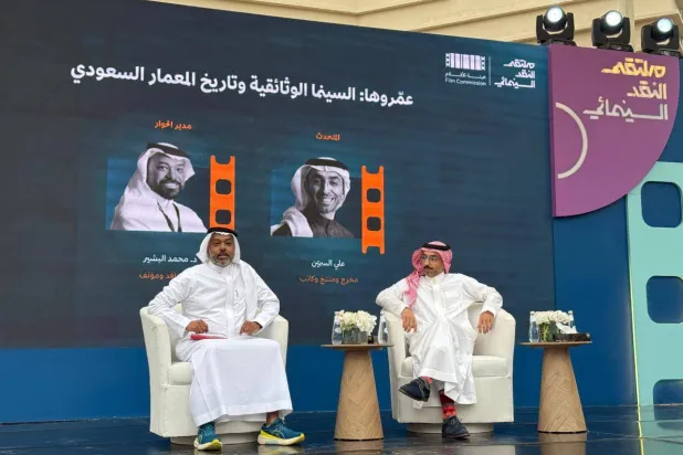 محمد البشير خلال محاورة علي السمين (الشرق الأوسط)