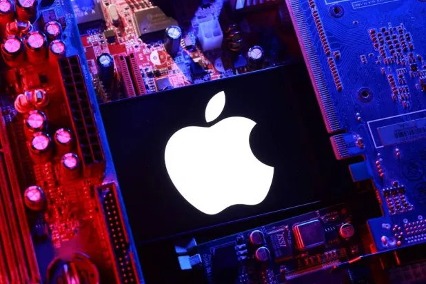 An Apple logo and a computer motherboard appear in this illustration taken August 25, 2025. (Reuters) 