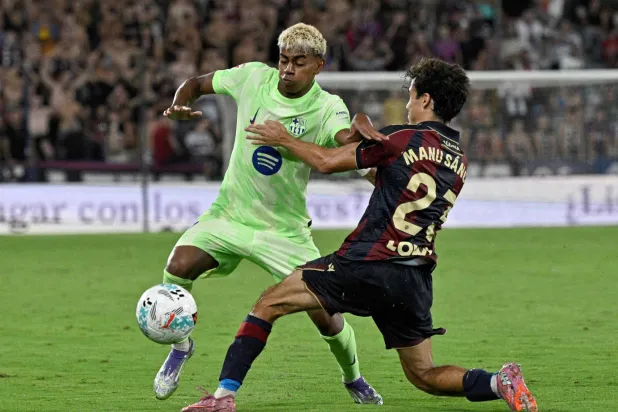 يسعى برشلونة حامل اللقب للحفاظ على سجله المثالي (أ.ف.ب)