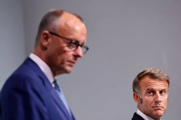  French President Emmanuel Macron and German Chancellor Friedrich Merz attend a joint news conference as part of a Franco-German cabinet meeting and a meeting of the Franco-German Defense and Security Council (CFADS) in Toulon, France, August 29, 2025. (Reuters)