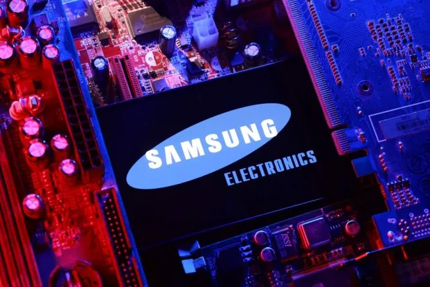  A Samsung Electronics logo and a computer motherboard appear in this illustration taken August 25, 2025. (Reuters)