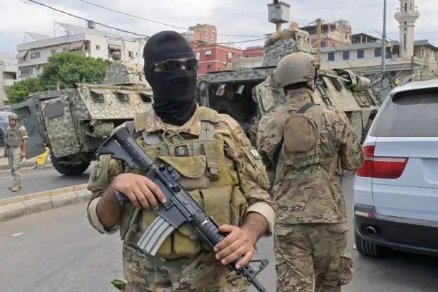 
Lebanese soldiers deploy at the entrance of Burj al-Barajneh Palestinian camp in southern Beirut (Asharq al-Awsat)
