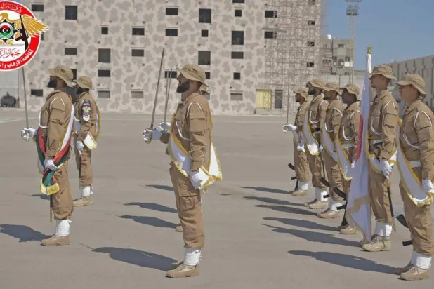عناصر تابعة لجهاز «الردع» خلال طابور عسكري في العاصمة طرابلس (الصفحة الرسمية للجهاز)