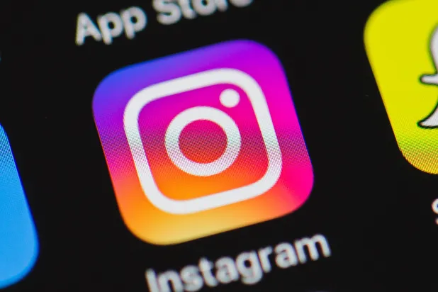 FILED - 17 May 2016, North Rhine-Westphalia, Duesseldorf: The Instagram logo is seen on an Apple iPhone 6. Photo: Rolf Vennenbernd/dpa