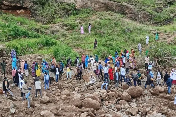 People gather as a Sudanese official announces recovery of 300 bodies after landslide destroyed Tarsin village, in Sudan, in this handout picture released September 4, 2025. (Sudan Liberation Movement/Army/Handout via Reuters) 