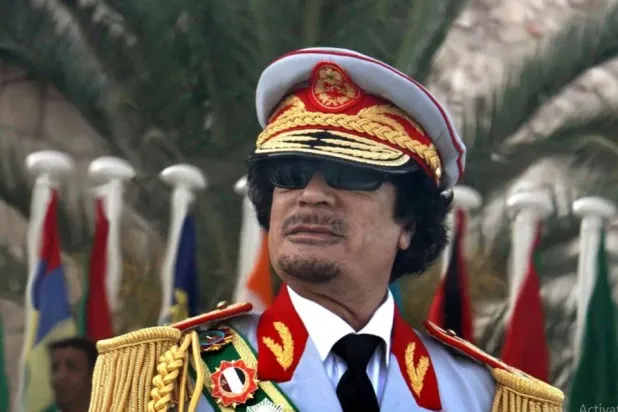 الرئيس الليبي الراحل معمر القذافي (إ.ب.أ)