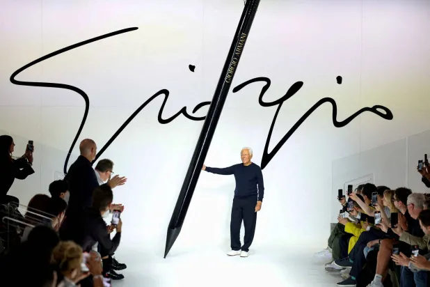 FILE PHOTO: Italian designer Giorgio Armani poses at the end of his Spring/Summer 2024 men's collection show during Fashion Week in Milan, Italy, June 19, 2023. REUTERS/Claudia Greco/File Photo