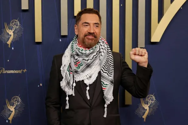 Javier Bardem wears a keffiyeh as he poses on the red carpet at the 77th Primetime Emmy Awards in Los Angeles, California, US, September 14, 2025. (Reuters)