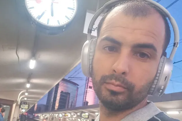 Muhammad Abu Dakha, a 31-year-old Palestinian from Gaza, takes a selfie at the train station in Brussels, Belgium August 25, 2025. (Muhammad Abu Dakha/Handout via Reuters)
