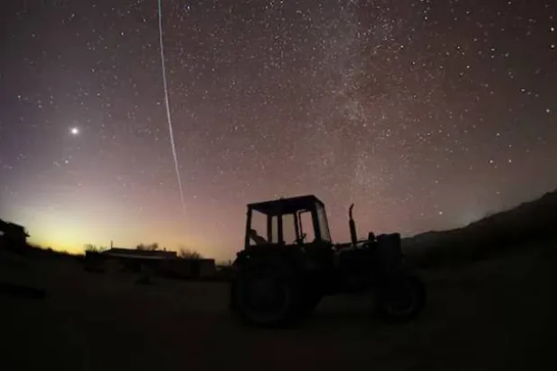 Starlink satellites are pictured in the sky over a farm in the Almaty Region, Kazakhstan January 25, 2025. REUTERS/Pavel Mikheyev/File Photo Purchase Licensing Rights
