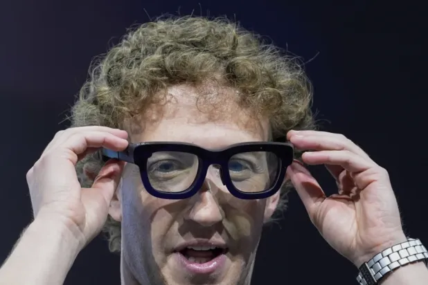 Mark Zuckerberg wears a pair of Orion AR glasses during the Meta Connect conference on Sept. 25, 2024, in Menlo Park, Calif. (AP Photo/Godofredo A. Vásquez, File)

