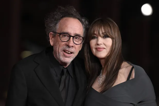(FILES) Italian actress Monica Bellucci (R) and partner US director Tim Burton attend and event at the 18th Rome Film Festival on October 19, 2023 in Rome. (Photo by Tiziana FABI / AFP)