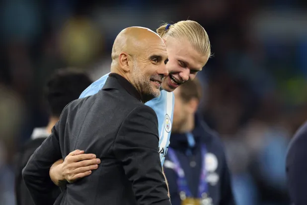 غوارديولا يذكّر بأن هالاند يمكنه تحطيم رقم رونالدو التهديفي في دوري الأبطال (إ.ب.أ)