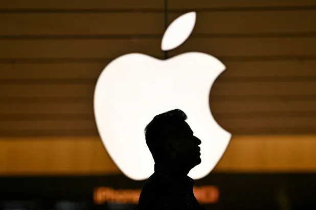A customer arrives to purchase the newly launched iPhone 17 at Apple Hebbal, in Bengaluru on September 19, 2025. (AFP)