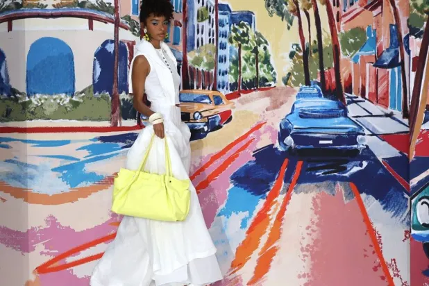 A model presents a creation at the Paul Costelloe runway show during London Fashion Week in London, Britain, 19 September 2025. The event runs from 18 to 22 September 2025. (EPA)