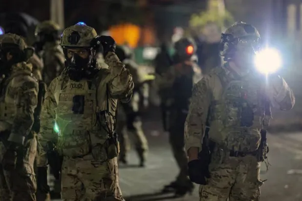 عناصر من الشرطة الأميركية في ولاية إلينوي (أرشيفية - رويترز)