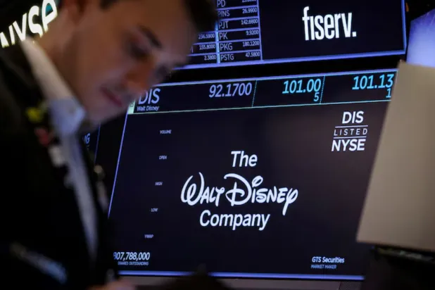 A screen shows the trading information and company logo for The Walt Disney company on the floor at the New York Stock Exchange (NYSE) in New York City, US, May 7, 2025. REUTERS/Brendan McDermid/File Photo 