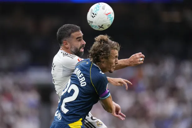 داني كارفاخال (يسار) سيغيب للطرد (أ.ب)