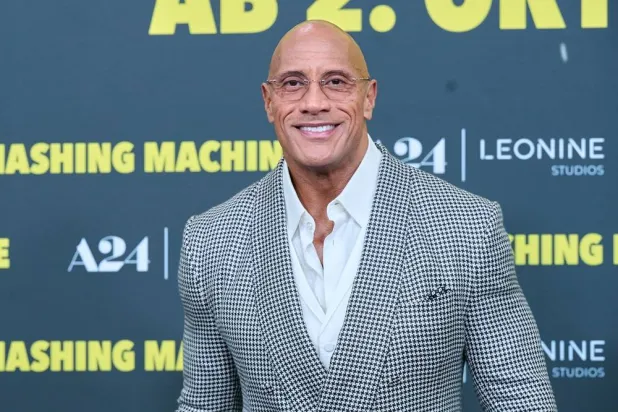  22 September 2025, Berlin: Dwayne Johnson (The Rock) poses as he arrives for the German premiere of "The Smashing Machine" the Zoo Palast. (dpa)