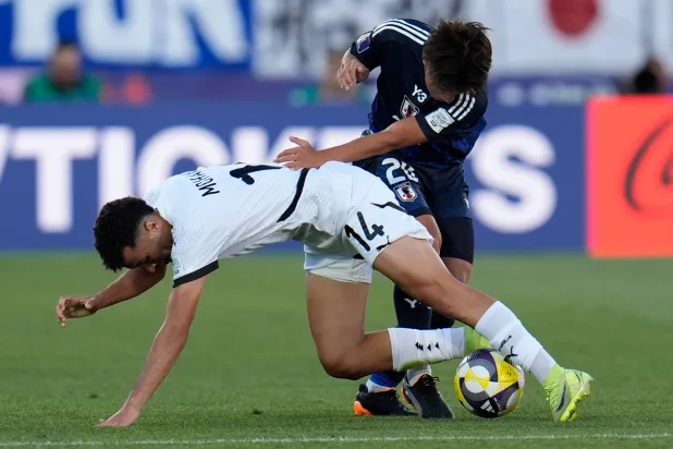 من المواجهة التي جمعت مصر واليابان (أ.ب)