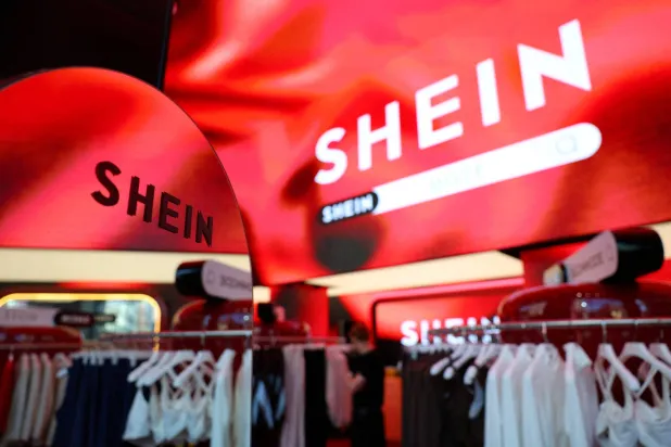 FILE PHOTO: Fashion retailer Shein's logo is seen at its pop-up store at immersive retail space Future Stores, ahead of its opening on September 26, in London, Britain, September 24, 2025. REUTERS/Isabel Infantes/File Photo
