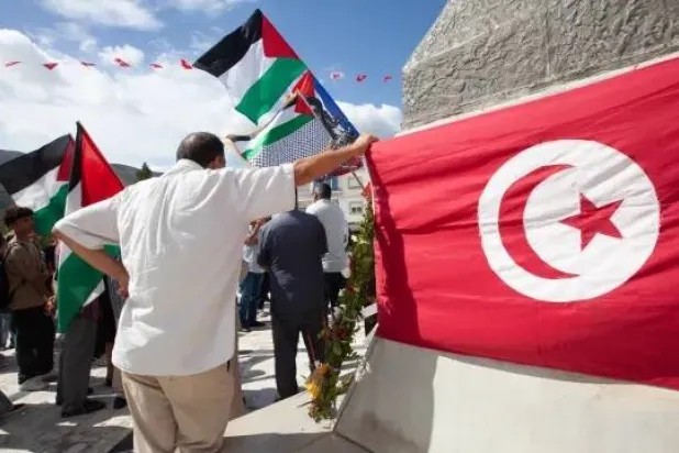 Demonstrators gather at a memorial site honoring the victims of the 1985 Israeli attack on Palestine Liberation Organization’s headquarters, in Hammam Chott outside Tunisia’s capital, Wednesday, Oct. 1, 2025. (AP Photo/Ons Abid) 