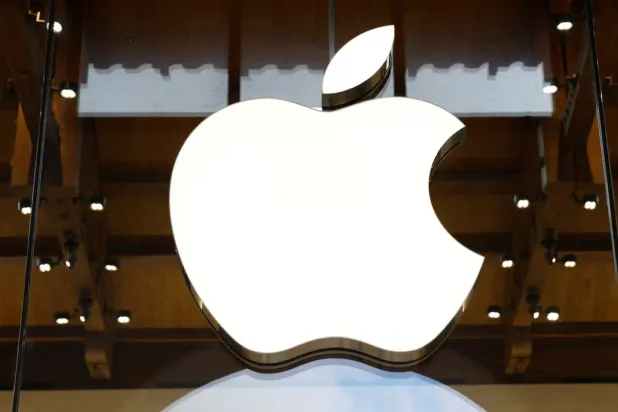 View of an Apple logo at an Apple store in Paris, France, April 23, 2025. REUTERS/Abdul Saboor/File Photo 