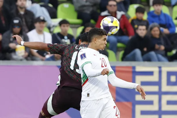 من المباراة التي جمعت المغرب والمكسيك (أ.ف.ب)