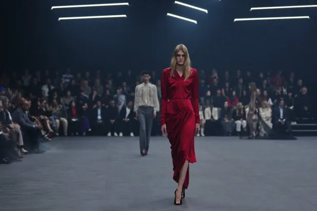 A model wears a creation as part of the Valentino Spring/Summer 2026 collection presented in Paris, Sunday, Oct. 5, 2025. (AP Photo/Aurelien Morissard)