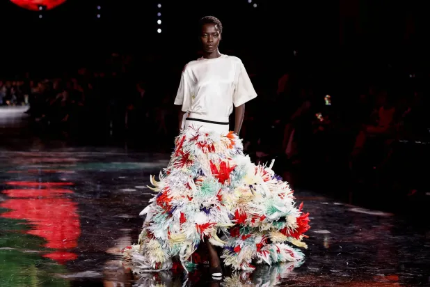 Model Awar Odhiang presents a creation by designer Matthieu Blazy as part of his Spring/Summer 2026 Women's ready-to-wear collection show for the fashion house Chanel during Paris Fashion Week in Paris, France, October 6, 2025. REUTERS/Benoit Tessier