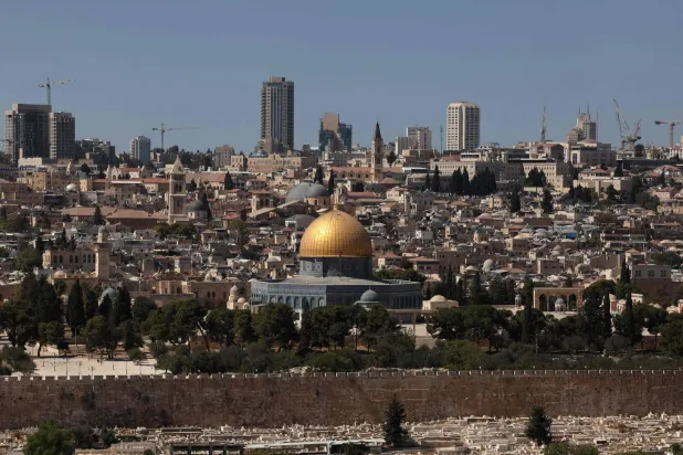  This picture taken from Mount of Olives shows the Dome of the Rock mosque at the Al-Aqsa Mosque compound in Jerusalem's Old City and and the city's high-rises in the background, on October 8, 2025. (AFP)