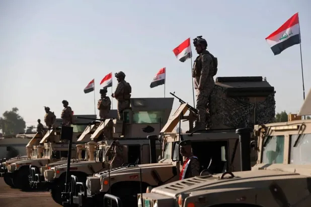 Iraqi soldiers during a training session supervised by French forces at the Taji military base north of Baghdad (AFP). 