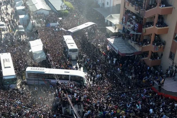 A drone view shows people gathering at Nasser hospital as they welcome freed Palestinian prisoners released by Israel as part of a hostages-prisoners swap and a ceasefire deal between Hamas and Israel, in Khan Younis in the southern Gaza Strip, October 13, 2025. REUTERS/Stringer     