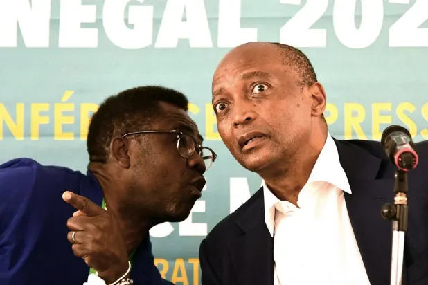 عدد من العاملين تحدثوا عن أجواء من التهديد والارتياب داخل أروقة «الكاف»... (أ.ف.ب)