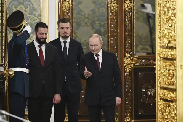Russian President Vladimir Putin welcomes Syrian President Ahmed al-Sharaa at the Kremlin, Wednesday. (DPA)