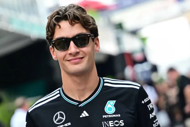 Mercedes' British driver George Russell arrives in the paddock ahead of the United States Formula One Grand Prix at the Circuit of the Americas in Austin, Texas, on October 16, 2025. (AFP)