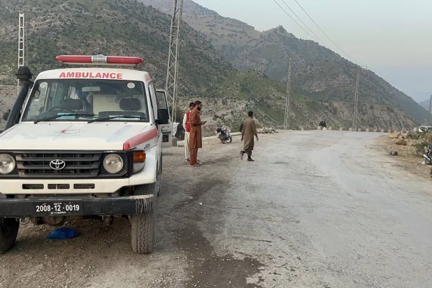 Volunteers stand on a road near the Pak-Afghan border in Kurram, Pakistan, 16 October 2025. EPA/BASIT GILANI